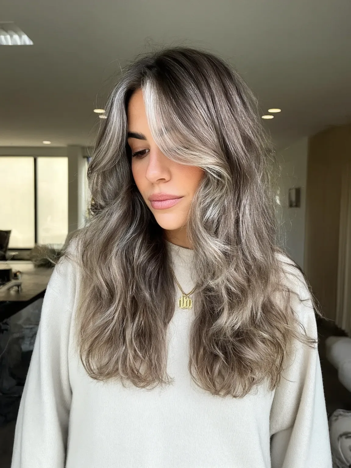 Voluminous Long Wavy Layers with Curtain Bangs and Ash Highlights